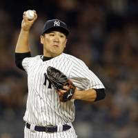 Tanaka picks up 12th victory
