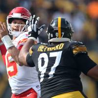 Chiefs quarterback Patrick Mahomes attempts a pass while under pressure from Steelers defensive tackle Cameron Heyward during the fourth quarter on Sunday at Heinz Field in Pittsburgh. The Chiefs won 42-37. Patrick Mahomes tosses six TDs to lead Chiefs to win over Steelers
