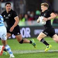 New Zealand’s Damian McKenzie carries the ball as teammate Anton Lienert-Brown runs alongside him in Saturday’s Rugby Championship match against Argentina at Trafalgar Park. Experimental All Blacks team overcomes Argentina in Rugby Championship test
