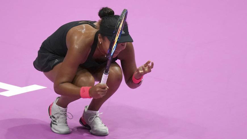 Naomi Osaka reacts after losing a point against Karolina Pliskova, of the Czech Republic, during the final of the Pan Pacific Open on Sunday in Tokyo. Pliskova won 6-4, 6-4 to take the title. Naomi Osaka upset by Karolina Pliskova in Toray Pan Pacific Open final