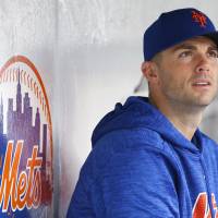 Mets third baseman David Wright is seen in the dugout at Citi Field on Thursday. Mets to activate David Wright for final homestand
