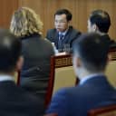 Chinese Ambassador to Canada Lu Shaye (center) meets with media at the Chinese Embassy in Ottawa Thursday.