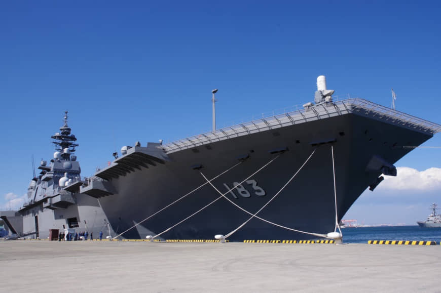 The helicopter carrier Izumo is docked at the Maritime Self-Defense Force base in Yokosuka, Kanagawa Prefecture, in March. | REIJI YOSHIDA