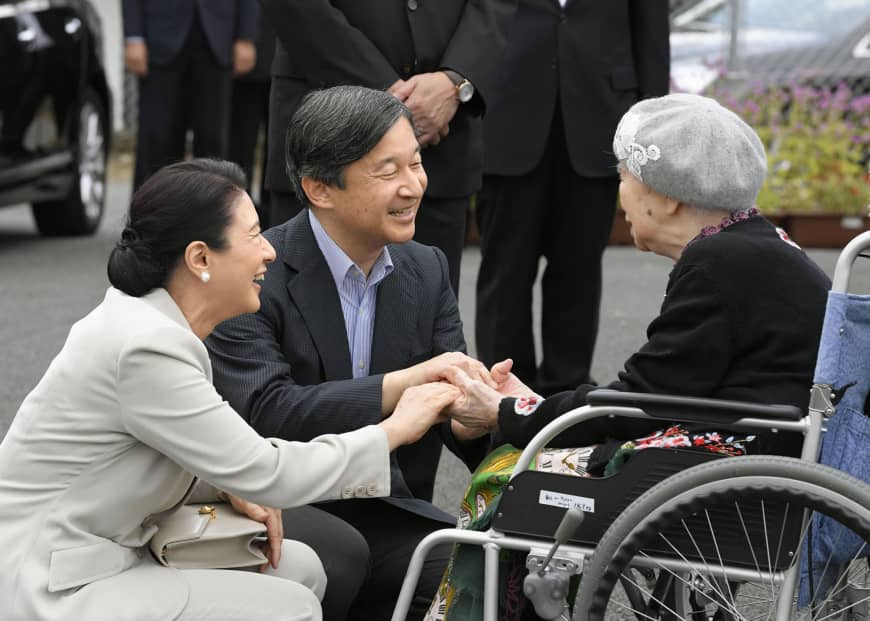 Then-Crown Prince Naruhito and then-Crown Princess Masako visit a temporary housing shelter on Sept. 26 in Asakura, Fukuoka Prefecture, after torrential rains hit the area in July 2017.