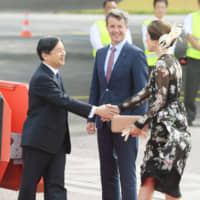 Then-Crown Prince Naruhito is greeted by Denmark's Crown Prince Frederik and Crown Princess Mary in June, 2017, during a visit to Denmark to celebrate 150 years of bilateral diplomatic ties. | KYODO