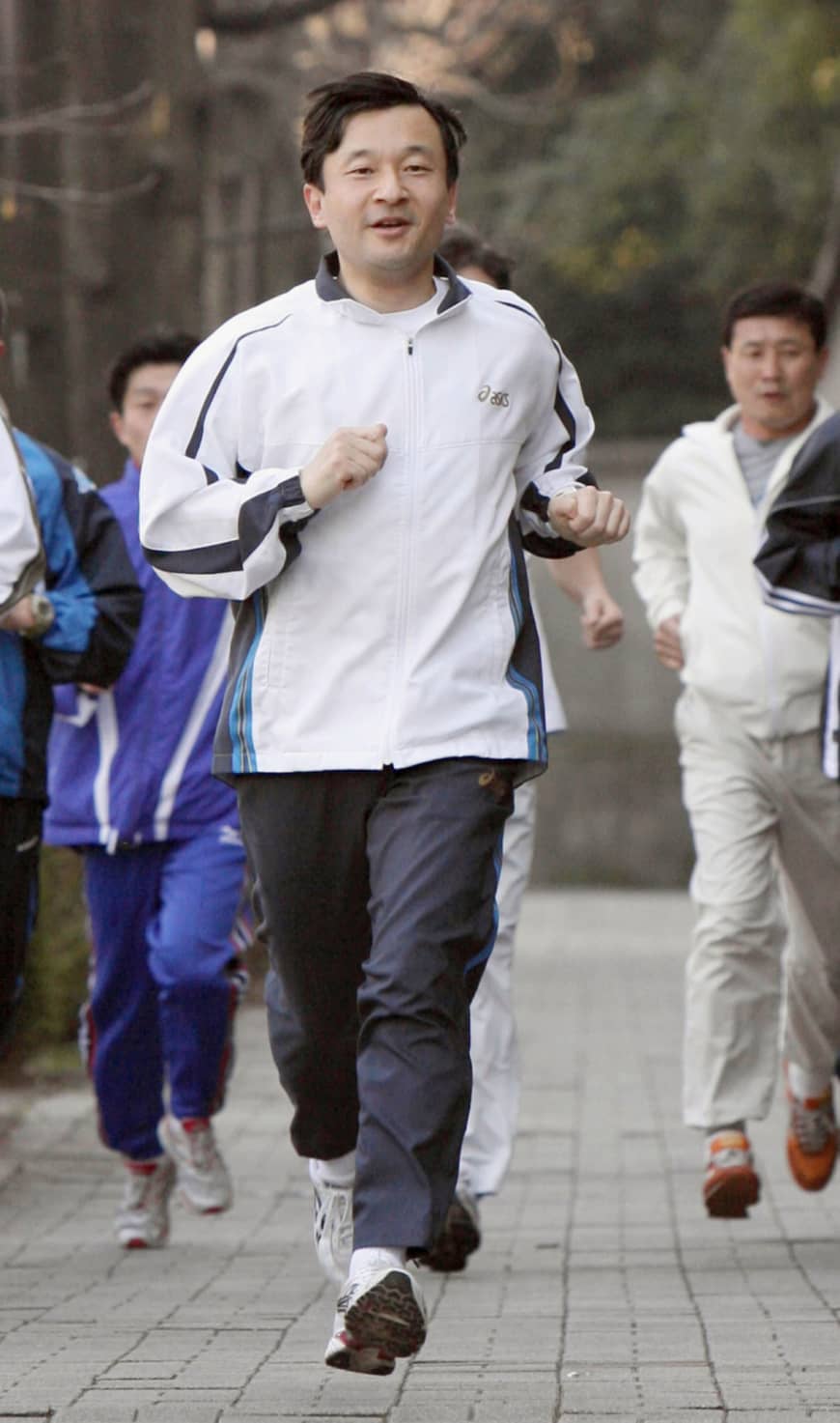 Then-Crown Prince Naruhito runs around Akasaka Estate in Tokyo in March 2008.
