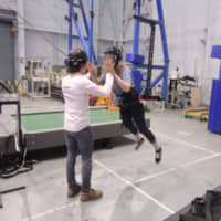 An experiment using the Active Response Gravity Offload System is conducted at the Johnson Space Center, NASA. | DOSHISHA UNIVERSITY