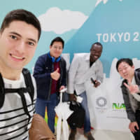 Mohamad Ghaith Alzin (far left) before flying to an international conference with his classmates and professor. | SOKA UNIVERSITY