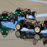 An automated miniature car demonstration at INIAD | TOYO UNIVERSITY