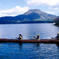 Marimo (moss balls) are brought back to Lake Akan during an annual Ainu ritual.