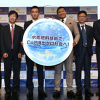 From left: Eneco Refresh Ltd. CEO Henry Heng, Shinichi Sugiura, professor of the Department of Clinical Pharmacy at Doshisha Women's College of Liberal Arts, Eneco Holdings Inc. CEO Yasuhiro Yamamoto, DNM Corp. Public Company CEO Somvang Khurulat, Man Shun Group Ltd. Chairman Lee Mun Bun and Eneco Energy Ltd. CEO Colin Moran | YOSHIAKI MIURA