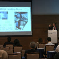 Akira Sakakibara, chief technology officer of Microsoft Japan Co. and the President of Microsoft Development Co. speaks at the Japan Times Advanced Technology Forum held in Tokyo on May 31. | YOSHIAKI MIURA