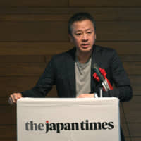 Akira Sakakibara, chief technology officer of Microsoft Japan Co. and the President of Microsoft Development Co. speaks at the Japan Times Advanced Technology Forum held in Tokyo on May 31. | YOSHIAKI MIURA