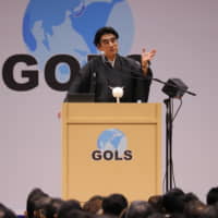 Worldwide Support for Development Chairman Haruhisa Handa delivers a speech during the fifth Global Opinion Leaders Summit in Tokyo on Oct. 17. | WSD