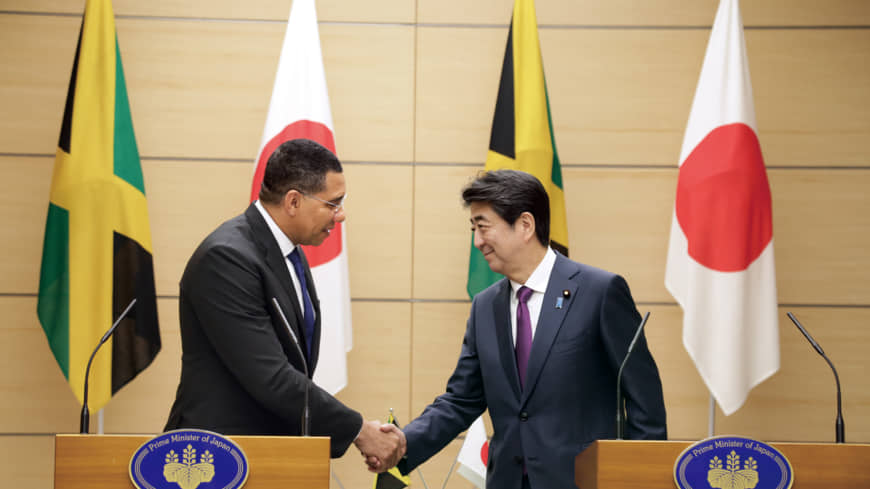 Jamaican Prime Minister Andrew Holness and Japanese Prime Minister Shinzo Abe at their joint press briefing in Tokyo last month.