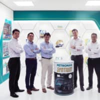 Officials of Petroplan Co. and PETRONAS: (from left) Kei Nakayama, Yoshitaka Ohno, Kenichi Fujita, Ezhar Yazid Jaafar, Faiz Azmi and Reza Ikram | PETRONAS
