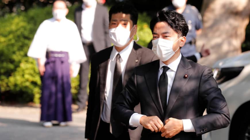 Cabinet members, including Shinjiro Koizumi, visit war-linked Yasukuni Shrine as Abe makes offering