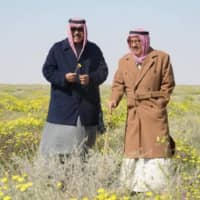 The late Amir of the State of Kuwait, H.H. Sheikh Sabah Al Ahmad Al Jaber Al Sabah (right), walks with then-Crown Prince, H.H. Sheikh Nawaf Al Ahmad Al Jaber Al Sabah, at Sabah Al Ahmad Natural Reserve. | EMBASSY OF KUWAIT
