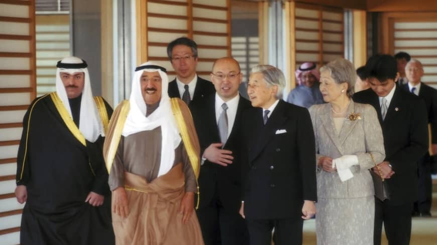 Above: The late amir of Kuwait (second from left) is escorted by Emperor Emeritus Akihito and Empress Emerita Michiko  through the Imperial Palace during a 2012 state visit to Tokyo.   | REUTERS / IMPERIAL HOUSEHOLD AGENCY OF JAPAN