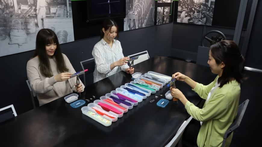 Visitors can join workshops to make their own zippers; it’s more difficult than it looks! | YKK GROUP