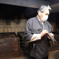 Yukiaki Tenpaku of Maruten Co. explains the firm's smoking and fermenting process used to make dried bonito skipjack for dashi, a cornerstone of Japanese cuisine | JANE KITAGAWA