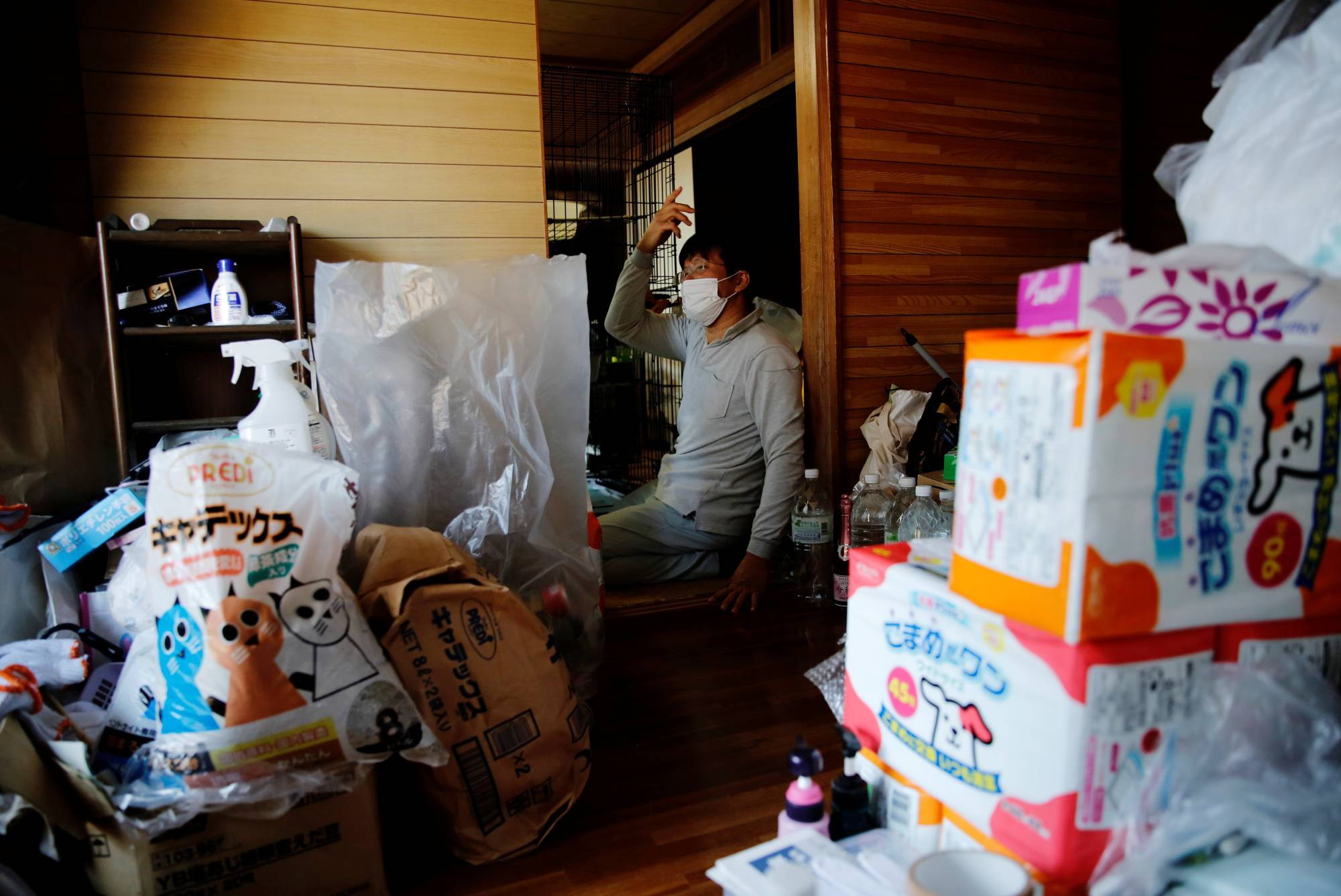 Sakae Kato estimates he spends around ¥750,000 a month on the stray cats her looks after in Fukushima Prefecture. | REUTERS