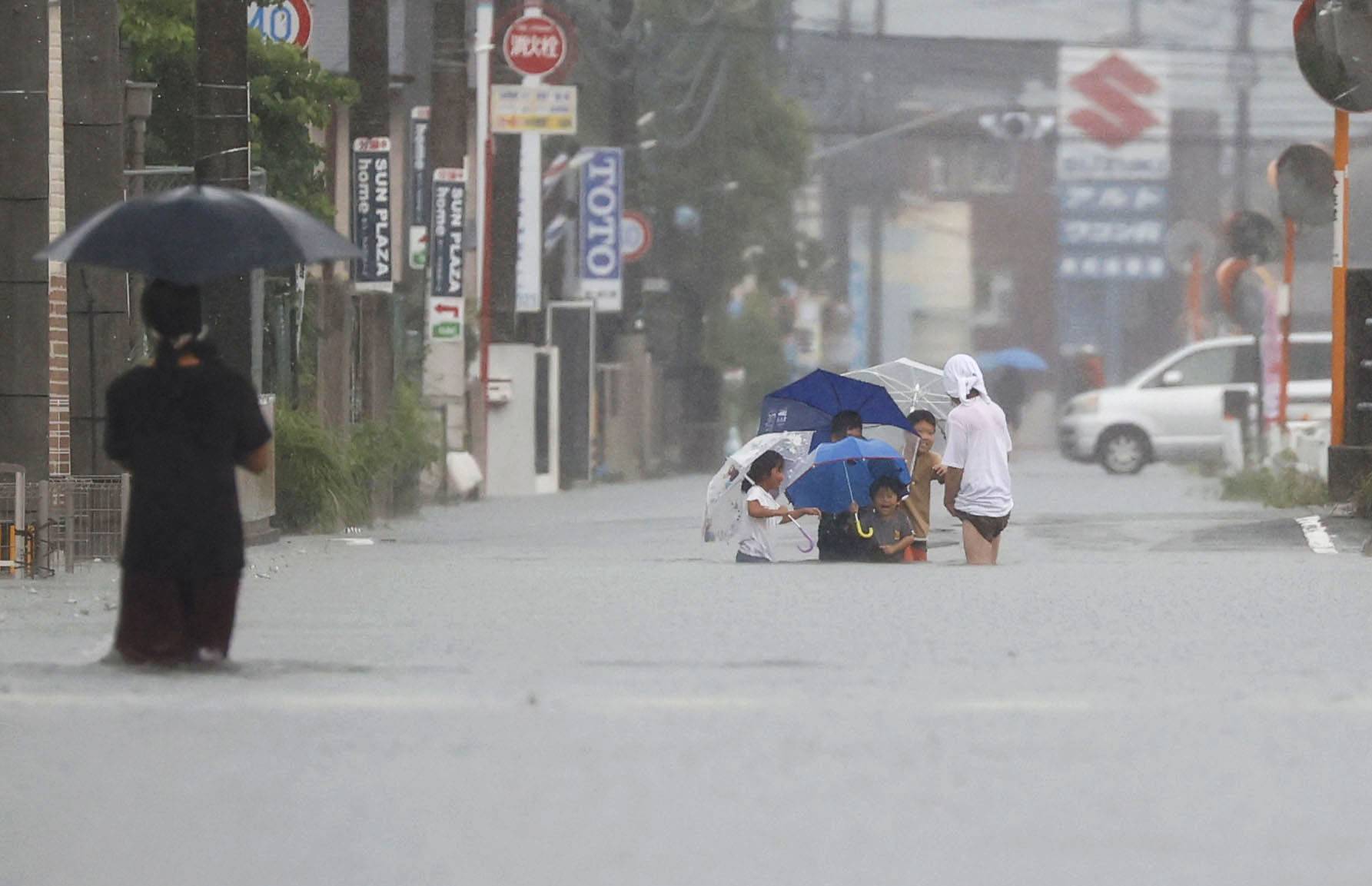 Japan officials urge people to secure safety as heavy rain warning issued  in Kyushu and Hiroshima | The Japan Times