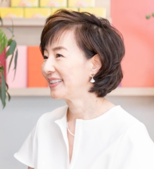 Kaori Sasaki, the founder and CEO of ewoman Inc. and Unicul International Inc., speaks during an interview in her office in Tokyo on July 28. | INTERNATIONAL CONFERENCE FOR WOMEN IN BUSINESS