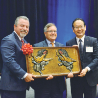 Left to right: Brooks Development Authority President and CEO Leo Gomez, former Brooks Development Authority Chairman Steven Goldberg and Nissei America President and Representative Director Hozumi Yoda at the official opening of Nissei America’s facility in Brooks in May 2018. | © BROOKS DEVELOPMENT AUTHORITY