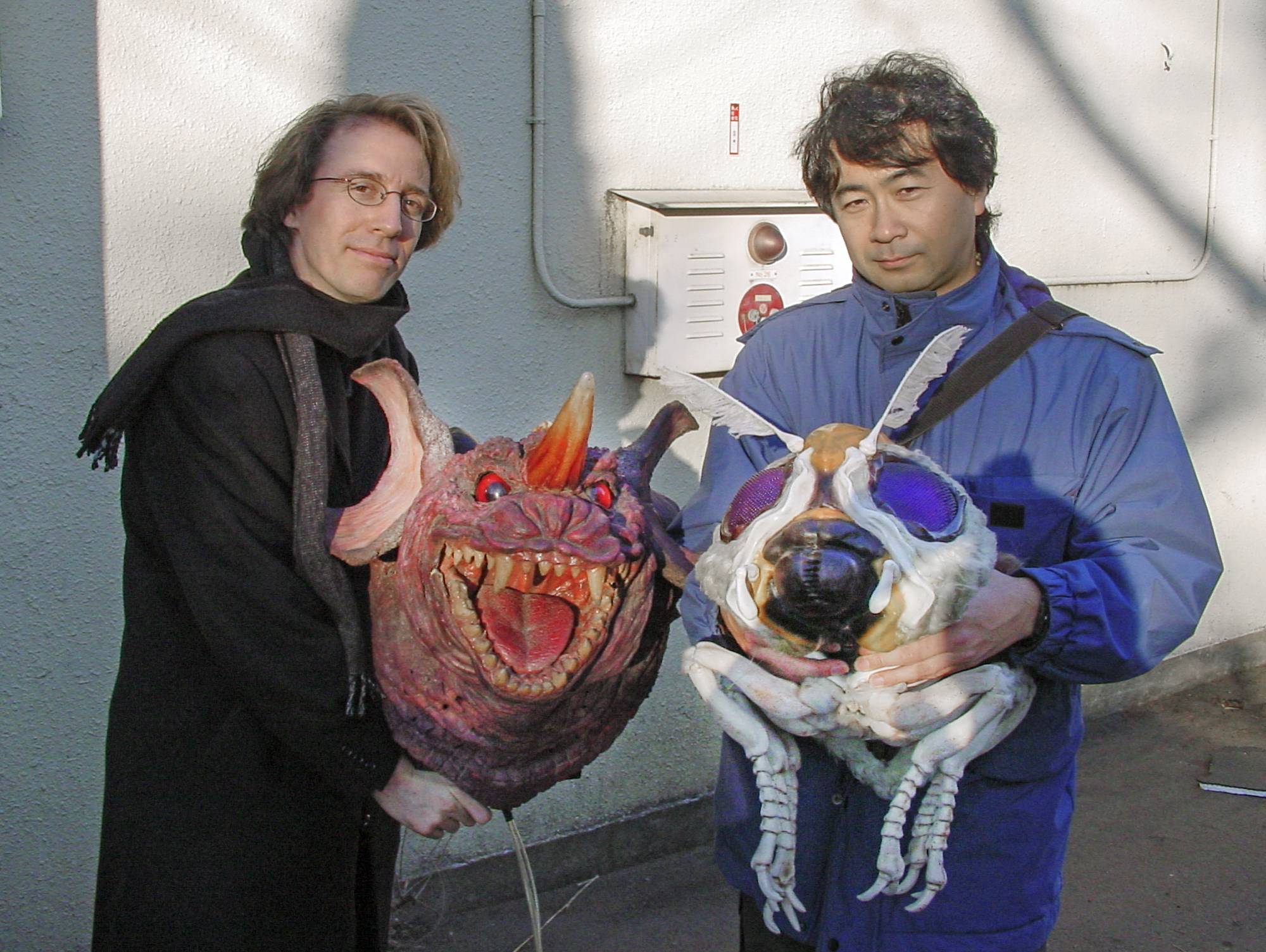 Norman England (left) and director Shusuke Kaneko (right) on the set of 