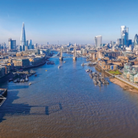Panoramic aerial view of London, UK. Beautiful skyscrapers, London city district, Tower Bridge and river Thames