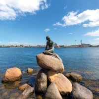 The Little Mermaid, bronze statue ,character from the fairy tale Hans Christian Andersen, the symbol of Copenhagen, Copenhagen, Denmark on June 22, 2019