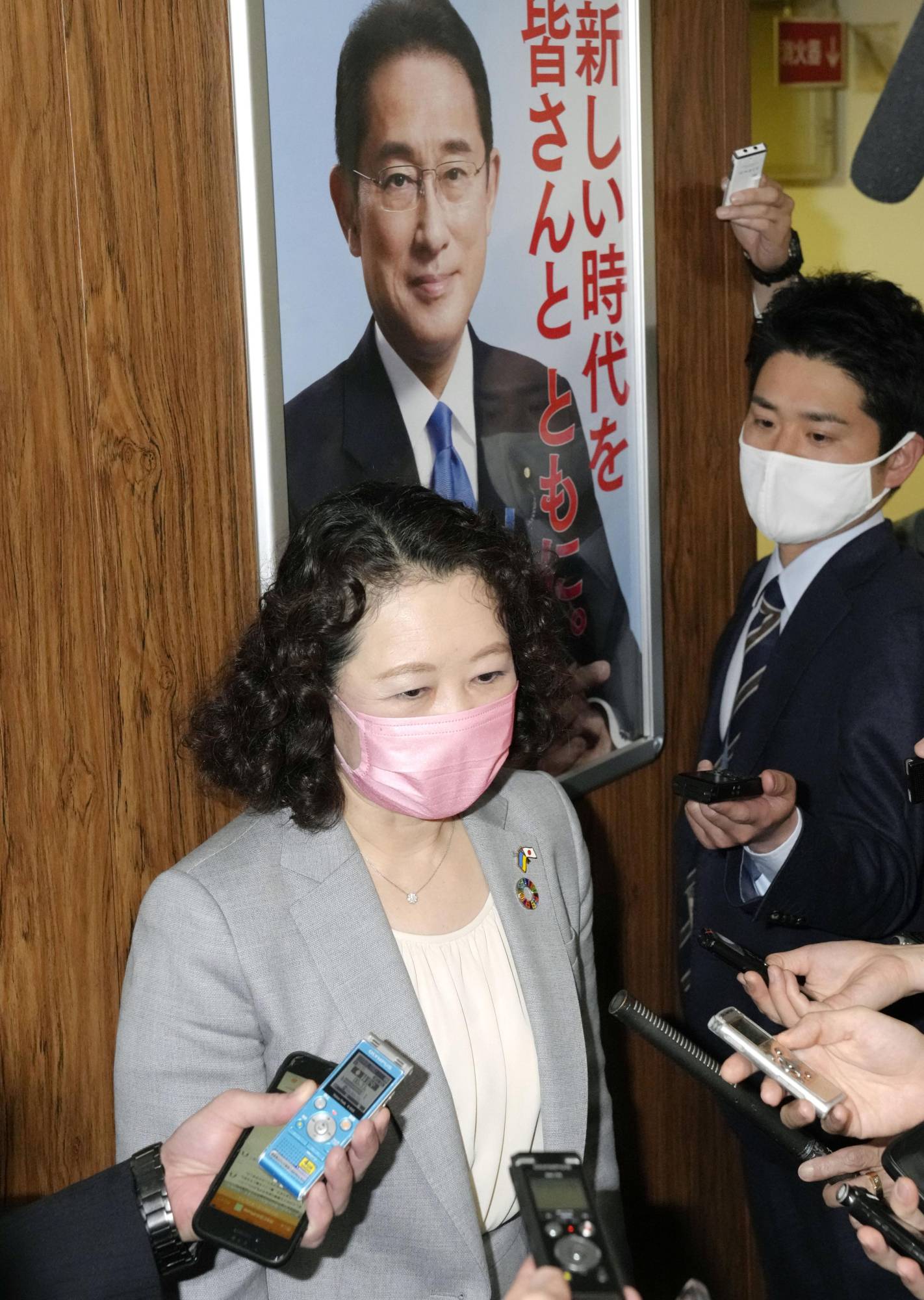 Rengo chief Tomoko Yoshino speaks to reporters at LDP headquarters in Tokyo on April 18. | KYODO