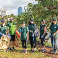 FICOH associate volunteers at a beach clean-up in December 2021