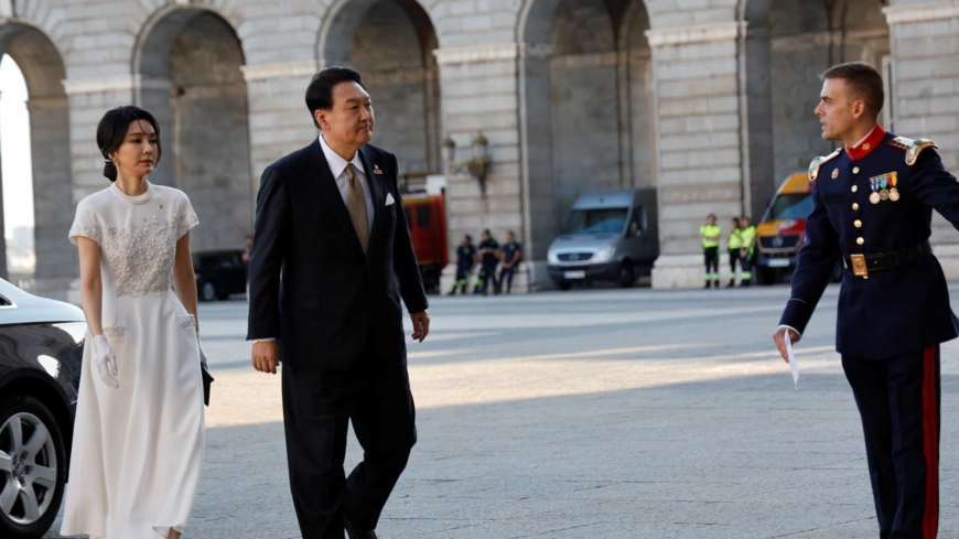 Leaders of Japan and South Korea briefly chat in person for the first time