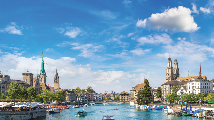 Historical part of Zurich with famous Fraumunster and Grossmunster churches in a beautiful summer day, Switzerland