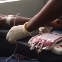 A person donates blood at the Malawi Blood Transfusion Service in Blantyre, Malawi. | SYSMEX