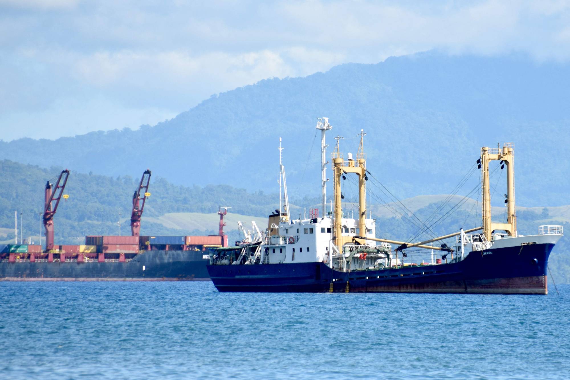 Ships anchored near Honiara port in the Solomons Islands on Aug. 30 | AFP-JIJI