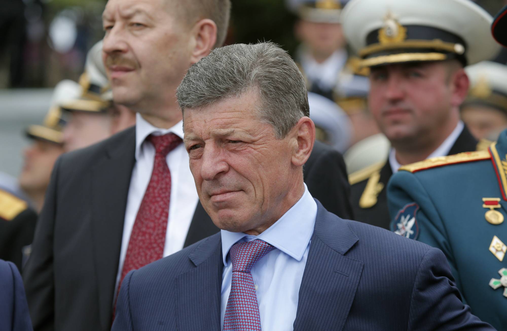 Kozak (center) waits for the arrival of Putin in Sevastopol, Crimea, in May 2014. | REUTERS