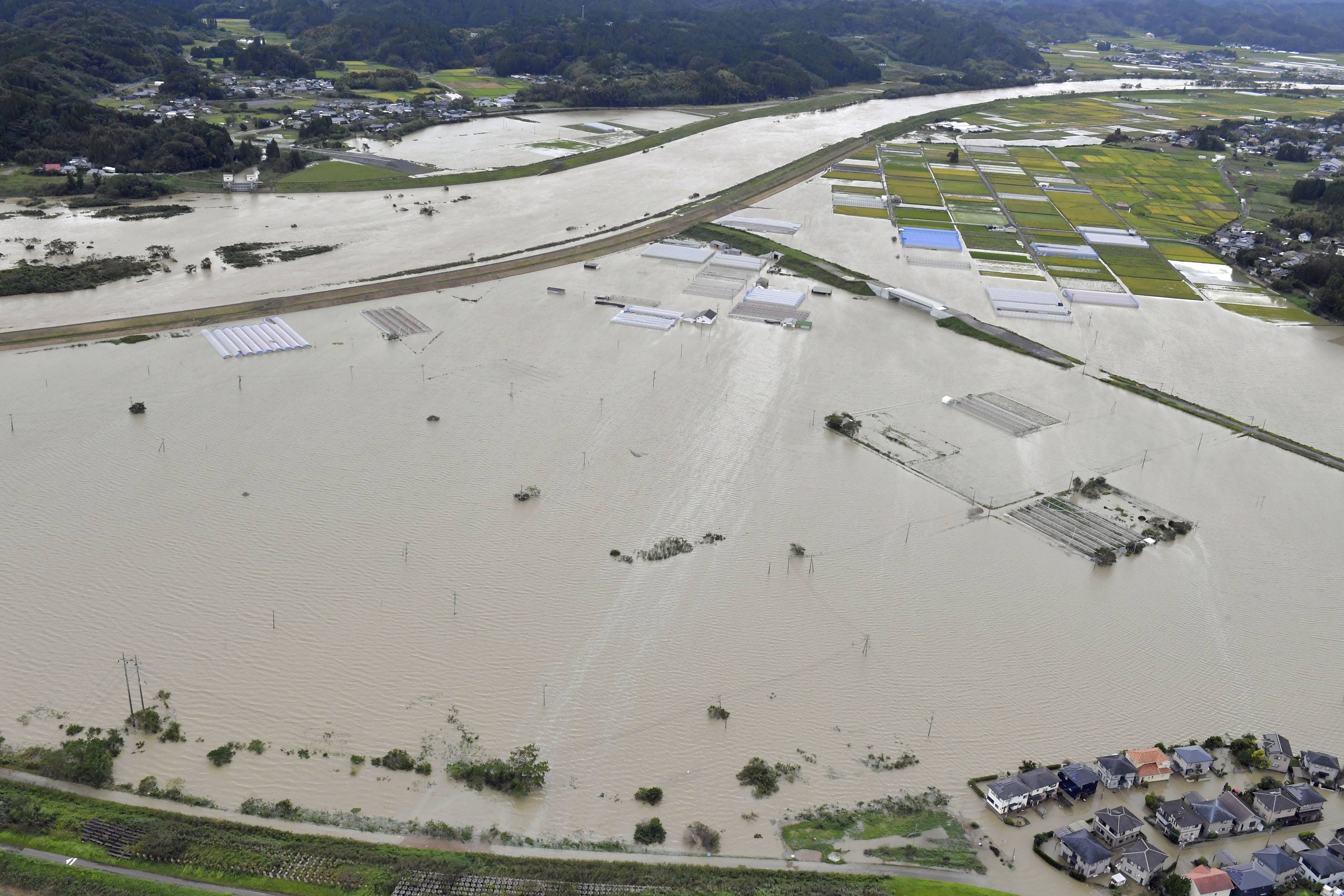 An aerial shot of flooding near the town of Kunitomi in Miyazaki Prefecture on Monday | KYODO