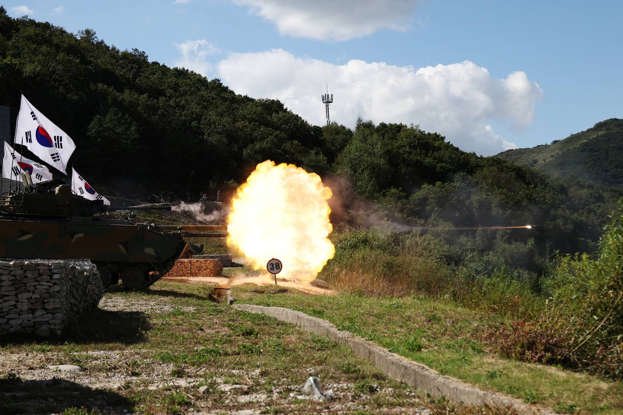 A South Korean K2 tank takes part in a live-fire military exercise that was part of DX Korea 2022 in Pocheon, South Korea, on Sept. 20. | REUTERS 