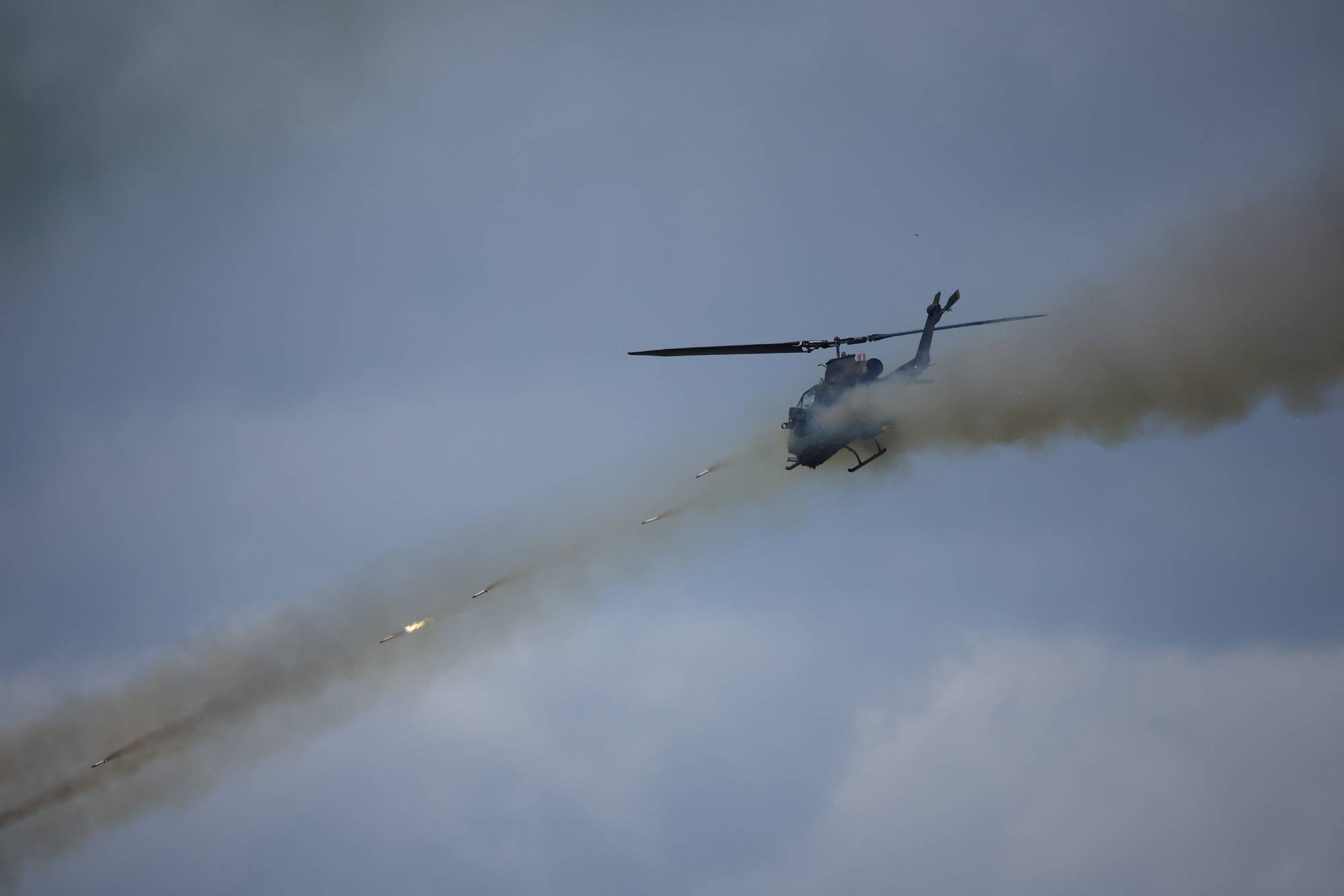 A South Korean army AH-1S helicopter participates in a live-fire military exercise in Pocheon on Sept. 20. | REUTERS