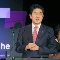 Abe delivers a speech in support of of gender equality and women’s empowerment in Japan at the United Nations Women 'HeForShe' reception in New York on Sept. 16, 2016. | KYODO