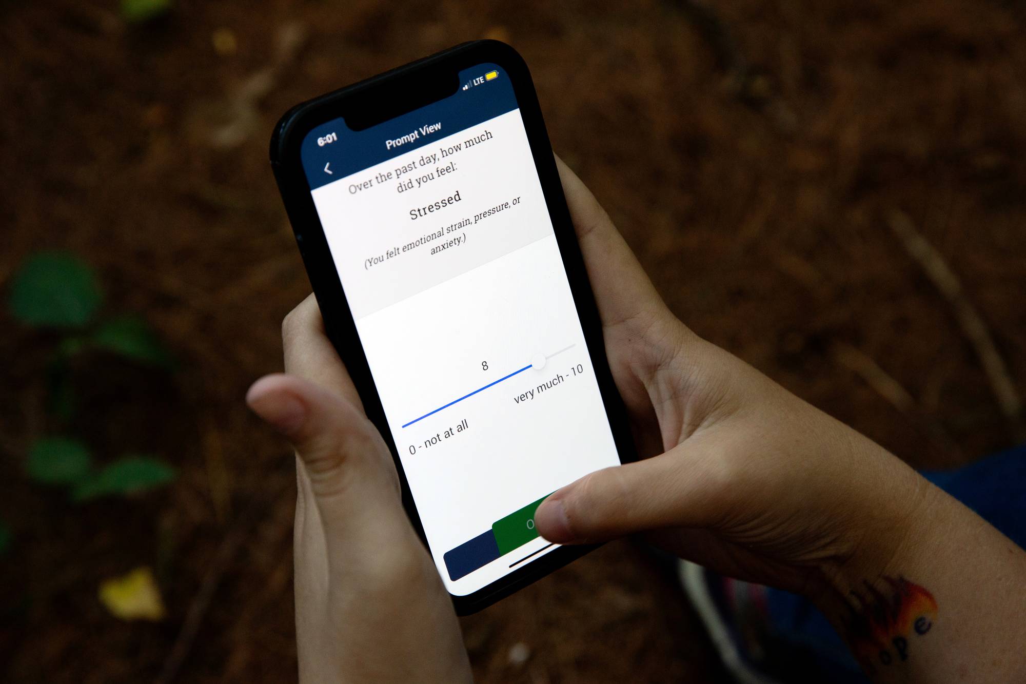 Cruz displays a survey question within an app on her smartphone. | KAYANA SZYMCZAK / THE NEW YORK TIMES