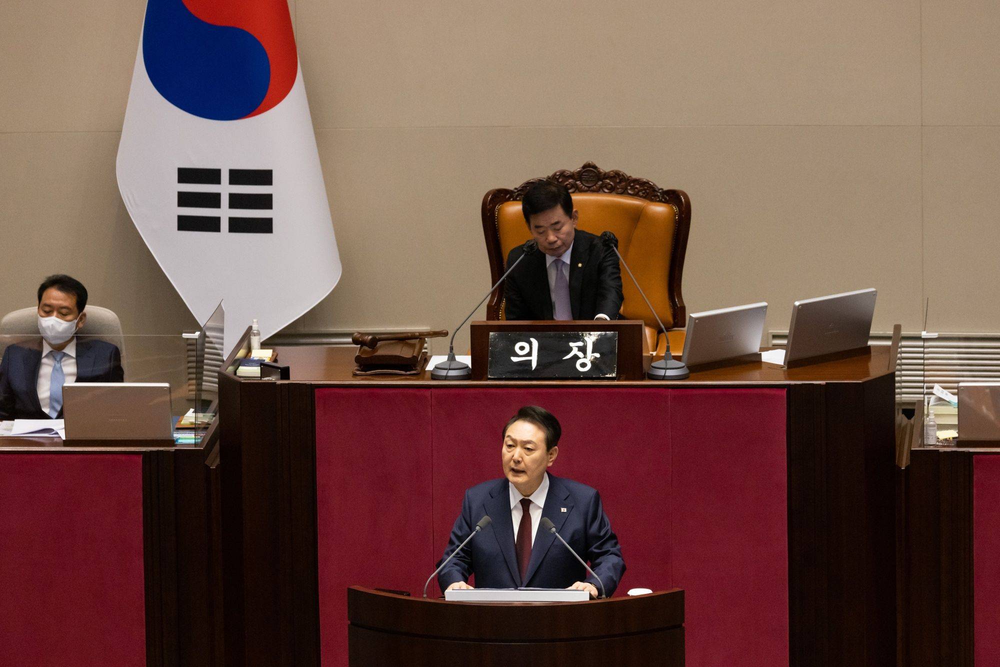 Yoon Suk-yeol, South Korea's president, delivers a budget speech at the National Assembly in Seoul on Tuesday. | BLOOMBERG 