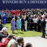 Queen Elizabeth II arrives at the racecourse at the Investec Derby Festival in Surrey, England, on June 2, 2018. | THE JOCKEY CLUB