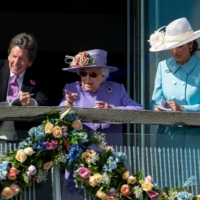 The queen watches the race from the balcony of the Queen’s Stand. | THE JOCKEY CLUB