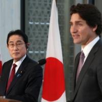 Prime Minister Fumio Kishida and his Canadian counterpart, Justin Trudeau, hold a joint news conference in Ottawa on Jan. 12. | AFP-JIJI
