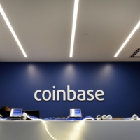 Coinbase Global said it is retreating from Japan as it grapples with a slump in crypto assets. | BLOOMBERG