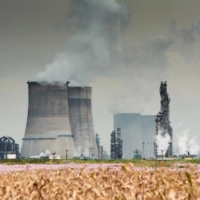 Vapor from cooling towers and chimneys at a coal-to-liquids plant in Mpumalanga, South Africa | BLOOMBERG 